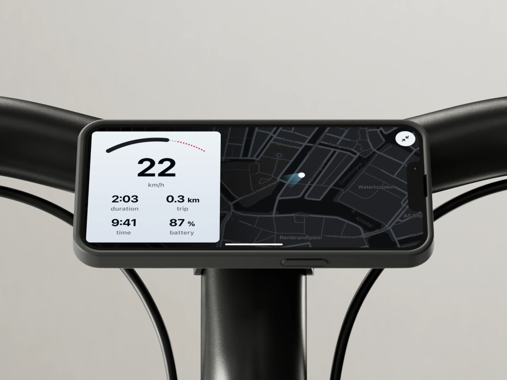 an iPhone mounted on a bike's handlebar and showing a mobile app for riding